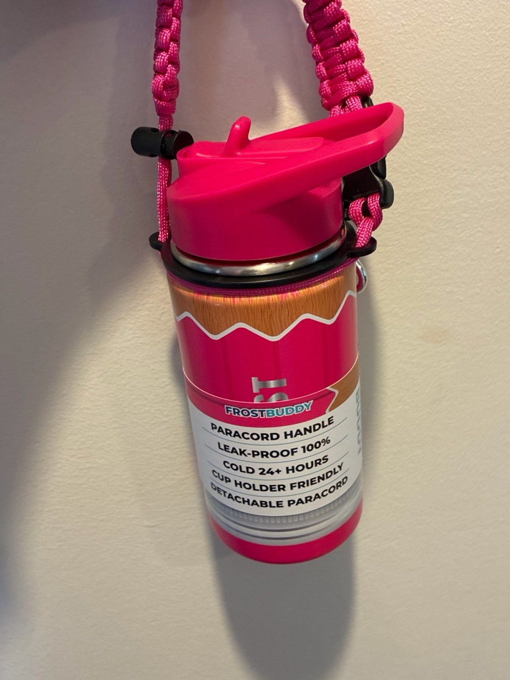 Hot Pink Insulated Frost Buddy Bottle with Paracord Handle and hook.